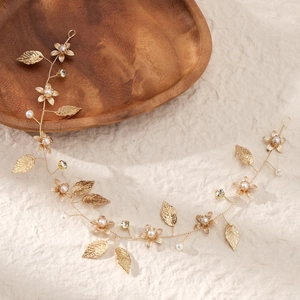 Handmade gold leaf bridal hair vine with pearls and rhinestones for wedding hairstyles