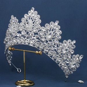 Close-up of Baroque silver bridal crown with intricate marquise and teardrop rhinestones