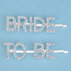 Silver Bride To Be rhinestone hair clips set for women on blue textured background