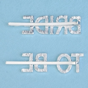 Silver alloy letter hairpins set featuring BRIDE and TO BE on blue textured background