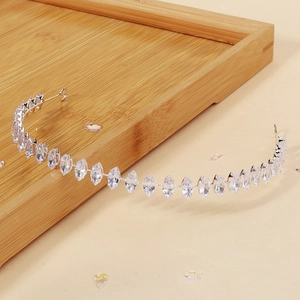 Minimalist marquise-cut zircon headband with silver metal base shown from a 45-degree angle