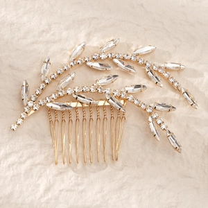 Elegant gold bridal hair comb with leaf motif and sparkling rhinestones for wedding