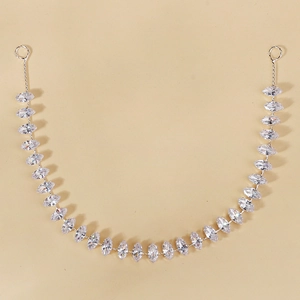 Detailed macro view of silver alloy hair chain with marquise-cut marquise-cut zircons