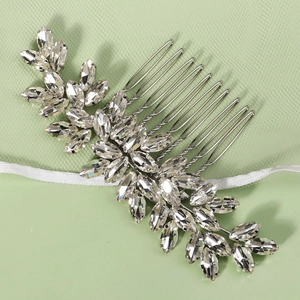 Elegant bridal rhinestone hair comb with marquise crystals on a silver leaf design