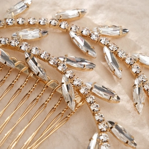 Elegant gold leaf bridal hair comb with sparkling rhinestones for wedding hairstyles