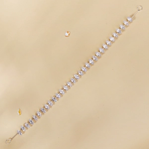Close-up of elegant marquise-cut crystal beads on a silver-toned metal hairband base