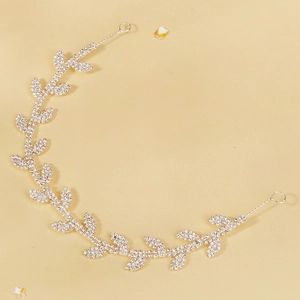 Serre-tête de mariée élégant en feuilles argentées avec strass brillants pour mariage