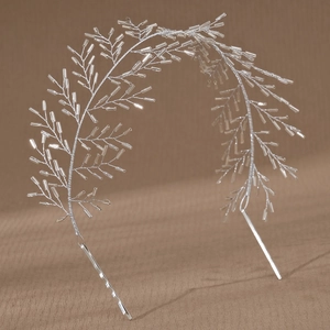 Detail of silver handcrafted bridal hair vine with crystal beads and metal clips