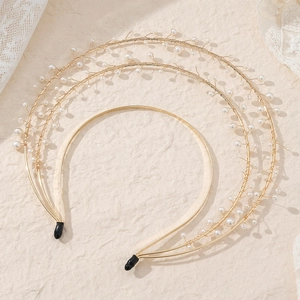 Elegant gold halo crown with layered faux pearls for a sun goddess wedding headpiece