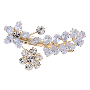 Elegant gold-plated hair clip with sparkling zircon flowers and leaves on white background