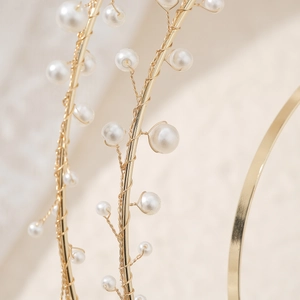 Golden sun goddess crown with three-layer halo and handmade pearls for weddings