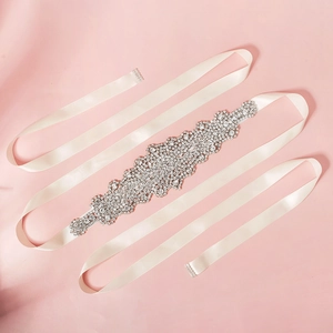 Elegant bridal wedding dress sash with hand-sewn silver rhinestones and ivory satin ribbon