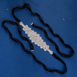 Sparkling rhinestone bridal belt with elegant geometric flower patterns on black satin ribbon