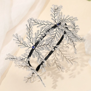 Exquisite bridal headband with crystal beads and blue gemstones on black wire