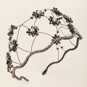 Vintage bridal headband with black faceted beads and crystals in floral design