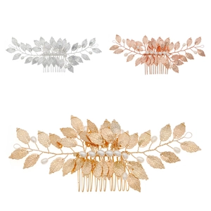 Detailed view of handmade leaf hair combs in gold, silver and rose gold with pearls