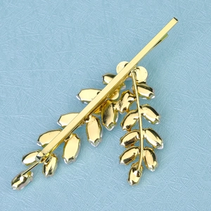 Golden leaf hair clip with pink crystal rhinestones and vintage bridal bobby pin design