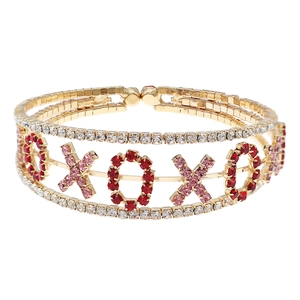 Bracelet ouvert doré XOXO étincelant avec strass roses et rouges pour femmes