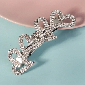 Barrette élégante en forme de cœur argentée avec strass blancs étincelants