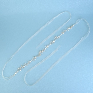 Handmade bridal belt with pearls and crystals on ribbons for wedding dresses