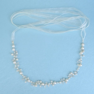 Elegant bridal hair vine with white pearls and crystals on a delicate gold wire