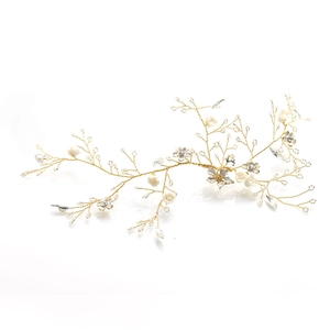 Exquisite handmade bridal headband with gold flower petals and sparkling rhinestones