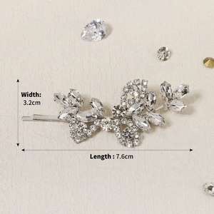 Macro detail of silver zircon flower hair clip showing 7.6cm length and 3.2cm width