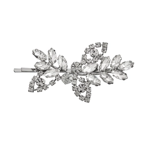 Detailed view of rhinestone flower hair clip with faceted crystals and silver metal base