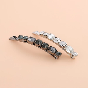 Detail of luxury rhinestone hair clips with crystal inlay on silver metal base