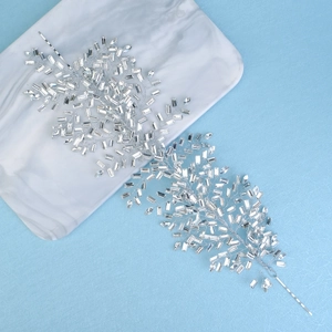 Luxurious silver bridal hair vine with crystal rhinestones for wedding hairstyles