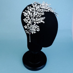 Detailed view of silver crystal bridal headband with intricate hand-woven wire design