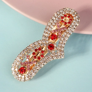 Barrette à cheveux avec strass étincelants, cristaux rouges et motif XOXO doré