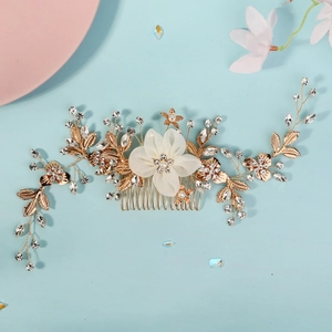 Elegant gold bridal hair comb with white fabric flowers, pearls and crystals decor