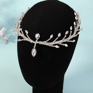 Detail of silver bridal forehead chain with rhinestones and water drop pendant