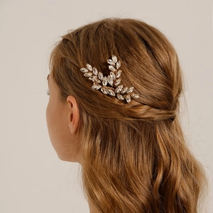 Macro detail of bridal crystal leaf hair comb showing marquise rhinestones in hair