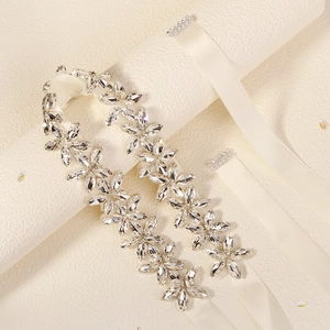 Luxurious bridal sash with sparkling marquise rhinestone flowers on cream satin ribbon