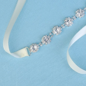 Elegant bridal chain belt with sunflower rhinestones and white satin ribbon ties
