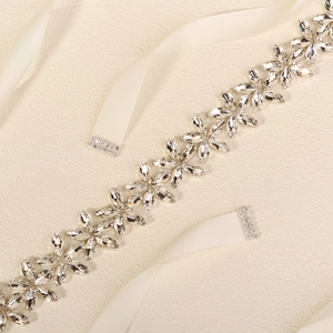 Luxury rhinestone bridal sash for wedding dresses with shimmering crystals and ivory ribbon