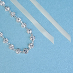 Elegant silver sunflower rhinestone belt with blue satin ribbon for bridal fashion