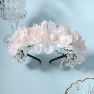 Elegant white floral bridal headband with transparent beads for weddings and parties