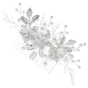 Detail of silver bridal hair comb featuring handcrafted pearl flowers and crystal beads
