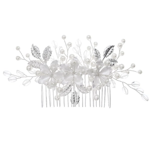 Detailed view of handmade silver bridal hair comb with pearls and metal flower petals