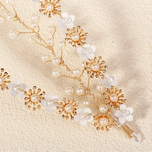 Handmade bridal headband with white flowers, gold branch wire, and elegant pearls