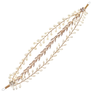 Elegant gold bridal hair vine with pearls and metal leaves on a clean white background