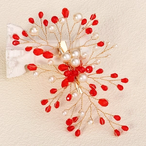 Handmade bridal hair clip with red crystals and white pearls on gold branches for weddings
