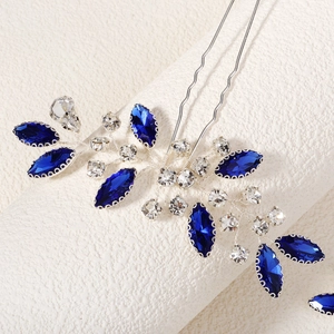 Elegant bridal hair pin with blue marquise rhinestones and silver floral branch design