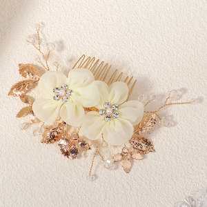 Exquisite bridal hair comb with cream fabric flowers, gold leaves and crystal beads