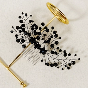Detailed close-up of handmade bridal hair comb with black faceted beads and wire branches