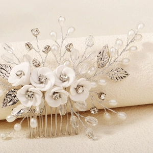 Elegant bridal hair comb with handmade white flowers, pearls and rhinestones on silver wire
