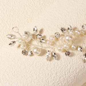 Elegant silver bridal headband with pearls and crystals in a handmade vine design